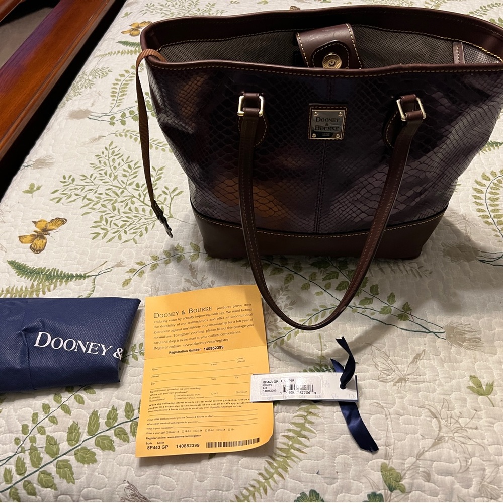 Genuine Dooney and Bourke all leather embossed shopper